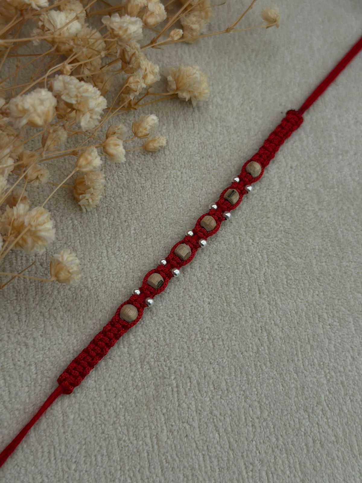 10 Silver Balls With Tulsi Dana Silver Rakhi (Red)