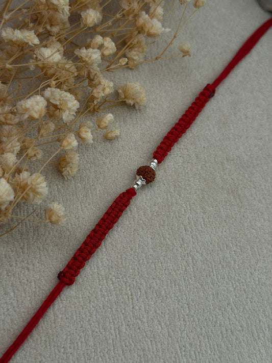 Single Rudraksha Silver Rakhi (Red)
